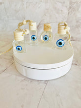 Cargar imagen en el visor de la galería, Ambientador para coche "Buena Suerte" | Difusor de aroma "Ojo de Pavo" (1 unidad) | Variedad de aromas