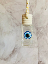 Cargar imagen en el visor de la galería, Ambientador para coche "Buena Suerte" | Difusor de aroma "Ojo de Pavo" (1 unidad) | Variedad de aromas
