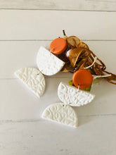 Load image into Gallery viewer, White textured earrings with pumpkin circle 
